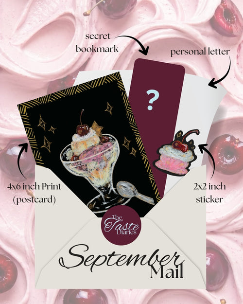 A promotional graphic for a 'September Mail' surprise card set by 'The Taste Diaries', showing a cream-colored envelope with a black and gold postcard featuring an ice cream sundae, a dark red postcard with a question mark, and a sticker, all labeled with arrows and text against a pink whipped cream and cherries background.